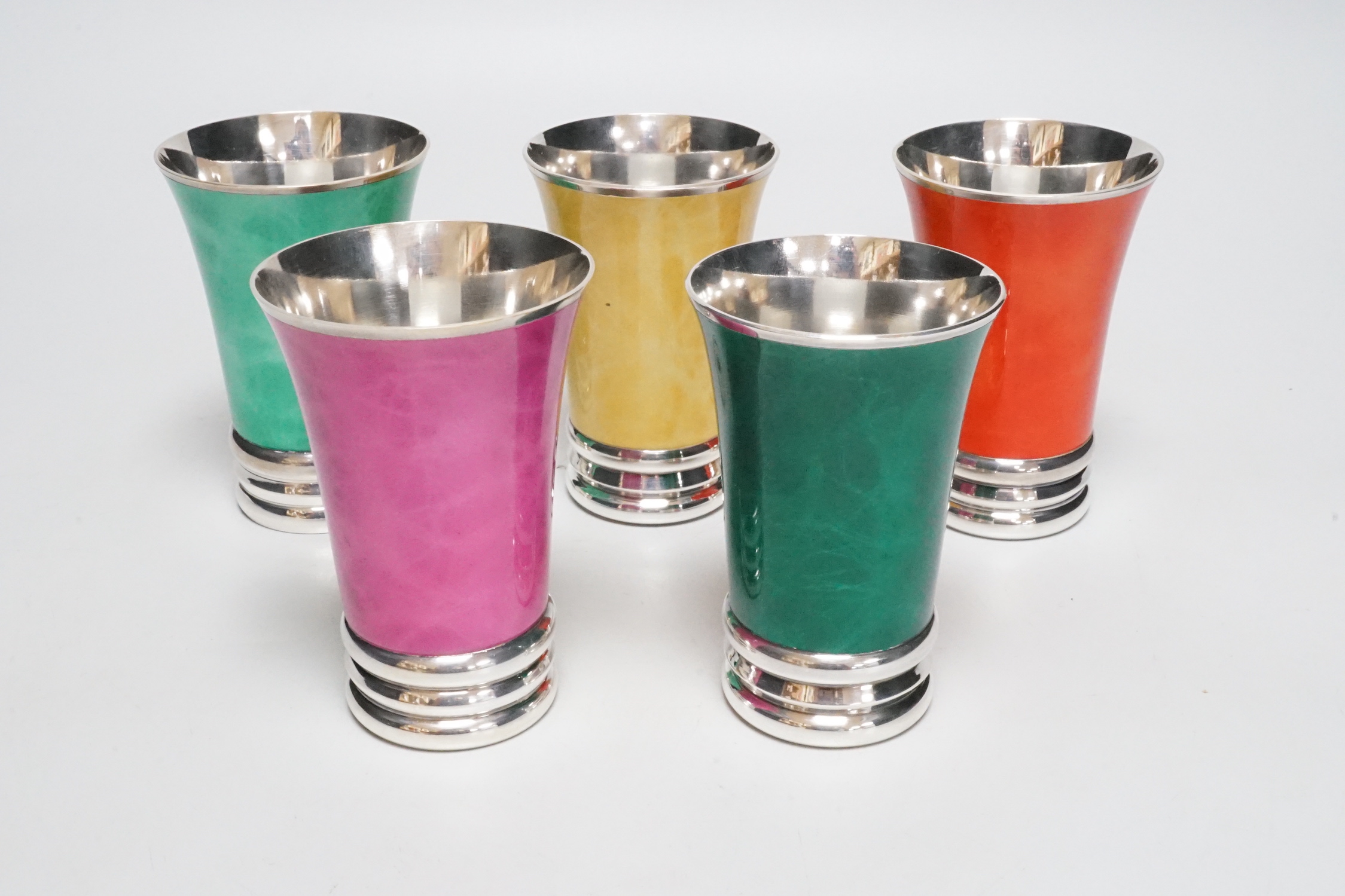 Gaube Du Gers, five French harlequin colour enamelled beakers, (stamped on base) 10cm high